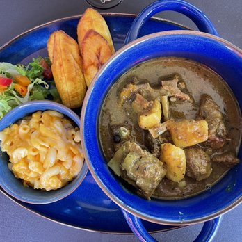 Reggae Pot - Curry Goat w/ Mac & Cheese and Fried Plantains - Caribbean Near Me - Centennial, Colorado Reggae Pot - Curry Goat w/ Mac & Cheese and Fried Plantains - Caribbean Near Me - Centennial, Colorado