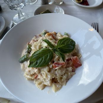 The Mill on the River - Lobster Pasta - Bow tie pasta with lobster, asparagus, and onion in a cream sauce - American Near Me - South Windsor, Connecticut The Mill on the River - Lobster Pasta - Bow tie pasta with lobster, asparagus, and onion in a cream sauce - American Near Me - South Windsor, Connecticut