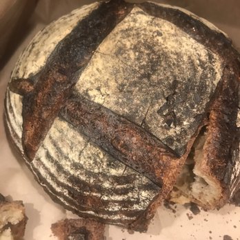 Black Bear Bread - Burnt sourdough that took me almost five mins to rip a hole into it - Breakfast & Brunch Near Me - Grayton Beach, Florida Black Bear Bread - Burnt sourdough that took me almost five mins to rip a hole into it - Breakfast & Brunch Near Me - Grayton Beach, Florida