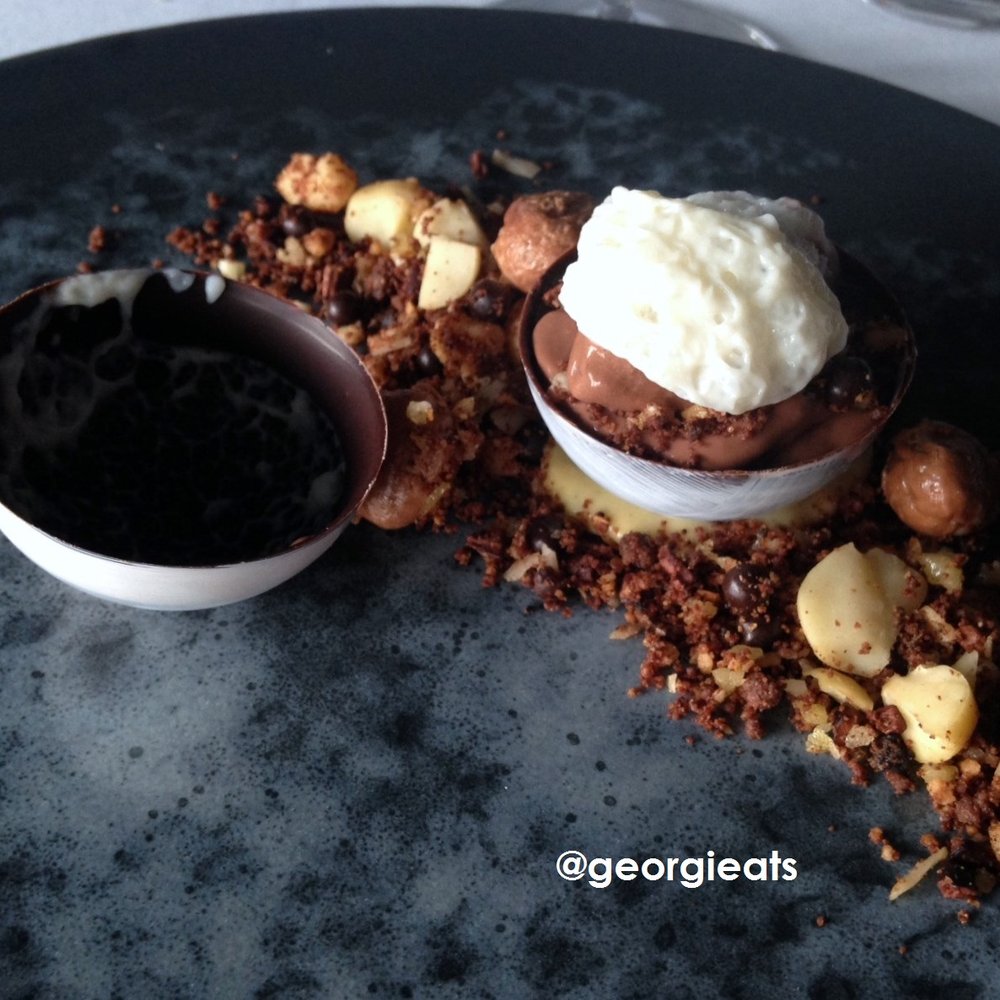 Sweet Cuisine - The most amazing dessert ever! A chocolate sphere with two mousses, macadamia nuts, cacao nibs, nougat and popping candy! - Desserts Near Me - Auckland, AUK