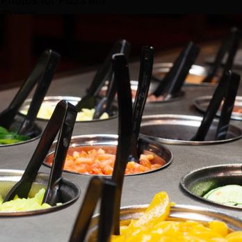 Pizza Inn - a variety of toppings in bowls - Pizza Near Me - Poplar Bluff, Missouri