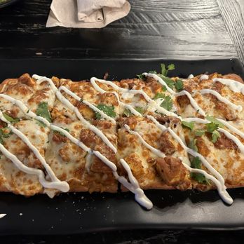 The Terminal Public House - Tikka Masala flatbread - Bars Near Me - Terre Haute, Indiana