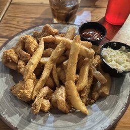 Deep fried shrimp and fries. Deep fried shrimp and fries.