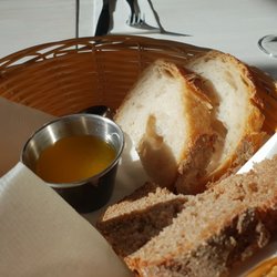 Smoker's Beer & BBQ - The free appetizer. The rye bread was bad, but the white sourdough was decent. I'd replace the melted butter with regular butter.