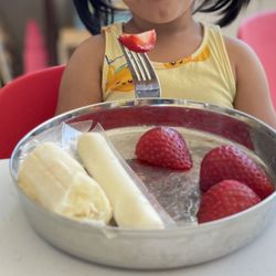 Orion Montessori - Evening snack: Bananas, string cheese and strawberries.