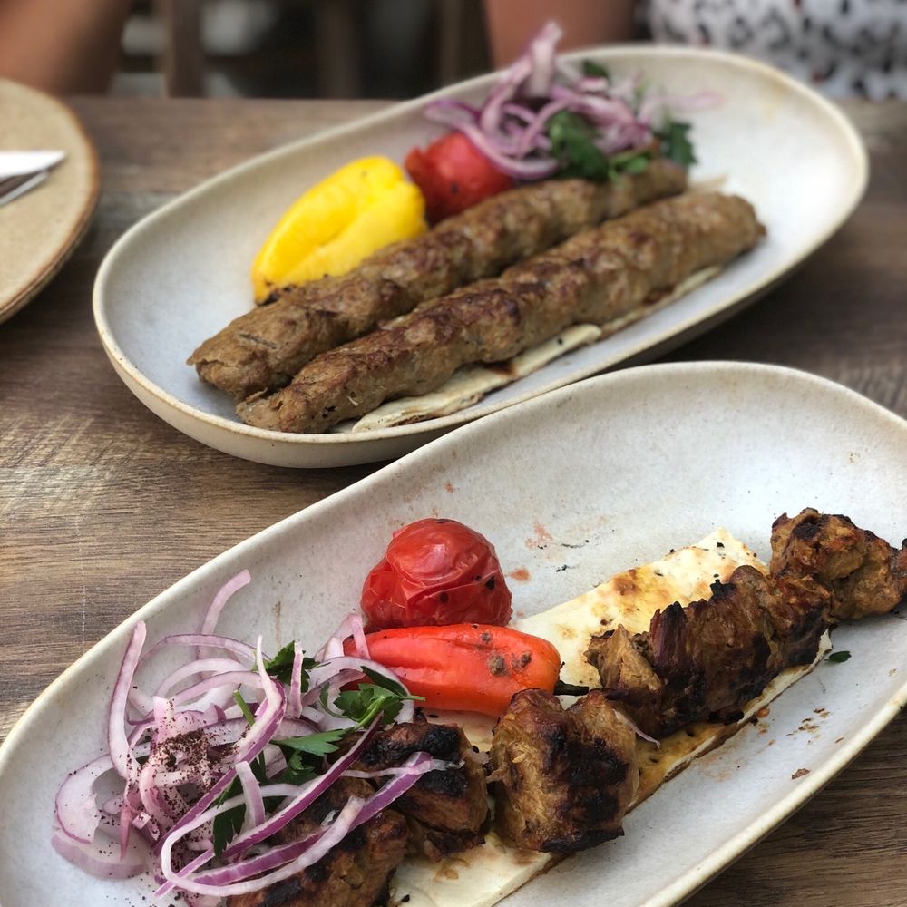 Delbar Middle Eastern - Chinjeh (front) and lamb kabob (behind) - Persian/Iranian Near Me - Alpharetta, Georgia Delbar Middle Eastern - Chinjeh (front) and lamb kabob (behind) - Persian/Iranian Near Me - Alpharetta, Georgia