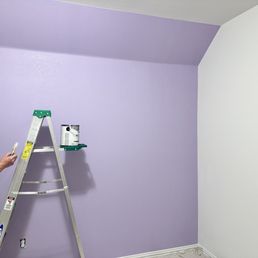 Picture of accent wall being painted Picture of accent wall being painted