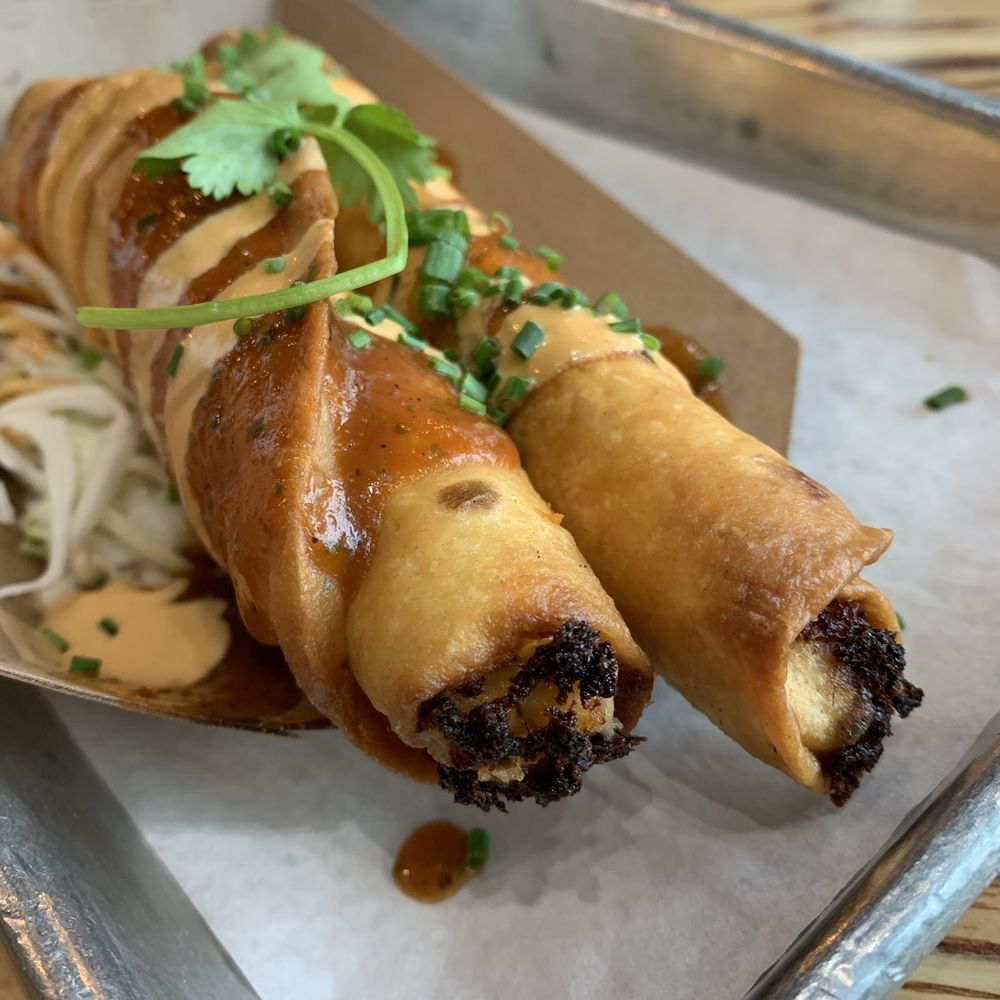 Slapfish - 2 Pieces Lobster Taquitos (sauce on top has a kick to it) - Seafood Near Me - Lehi, Utah Slapfish - 2 Pieces Lobster Taquitos (sauce on top has a kick to it) - Seafood Near Me - Lehi, Utah