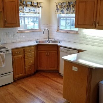 Northland Handyman - Kitchen after NEW quartz countertops and tile backsplash. - Handyman Near Me