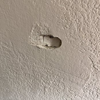 Quality Inn By Choice Hotel - Holes in Walk - Hotels Near Me - Flagstaff, Arizona