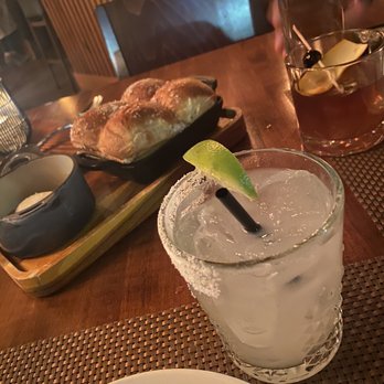 Oak Steakhouse - Margarita and old fashion. Our waiter informed us that the bread is made fresh daily. The rolls were - Steakhouses Near Me - Raleigh, North Carolina