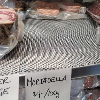 Calabria Meat Market - House made Mortadella sausage - Meat Shops Near Me - Vancouver, British Columbia Calabria Meat Market - House made Mortadella sausage - Meat Shops Near Me - Vancouver, British Columbia