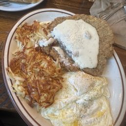 Country fried eggs, hashbrowns, and eggs Country fried eggs, hashbrowns, and eggs