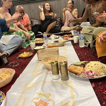 Kebab & Co - Takht area, with cushions for our communal birthday dinner. We had 11 people and maxed out the space - Afghan Near Me - Columbus, Ohio