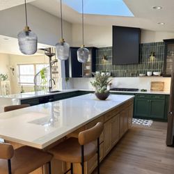 Impact Pro Refinishing - Custom cabinet refacing in both paint and stain finishes