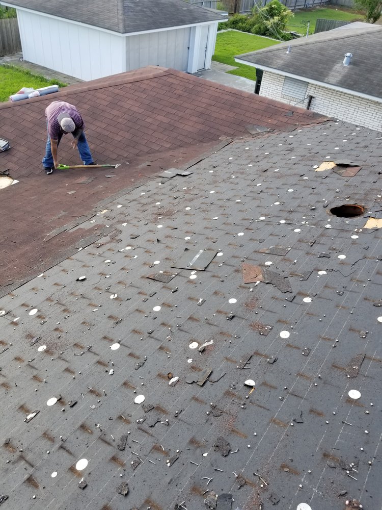 Slide of Vela's Roofing and Construction