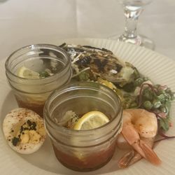 Blue crab cocktail, shrimp cocktail , ceasar salad, pasta, salad, and a pea salad