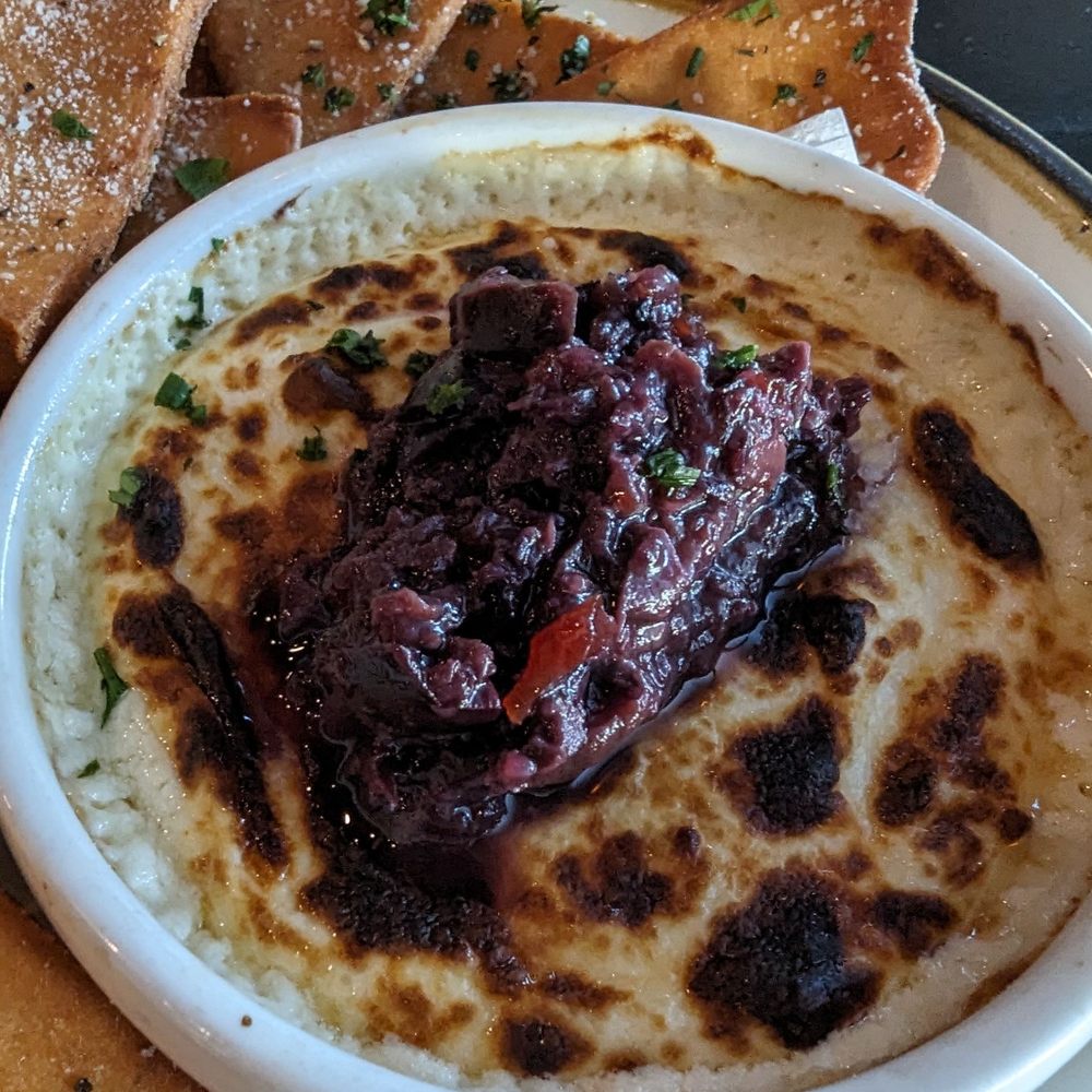 Cellar House - Goat cheese with with olive and grape and fresh pita triangles. Yes please! - Wine Bars Near Me - St Louis, Missouri