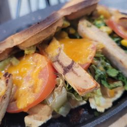 Wonder Waffel - This is the Mexican. Chicken, tomatoes, greens, in between a savory waffle.