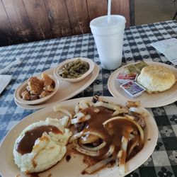 Double J Restaurant - Hamburger steak with onions and gravy. Two sides, dessert and biscuit. $9.95.  GREAT DEAL!