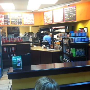 Dunkin' - a young boy sitting at a counter in a fast food restaurant - Donuts Near Me - Bessemer, Alabama Dunkin' - a young boy sitting at a counter in a fast food restaurant - Donuts Near Me - Bessemer, Alabama