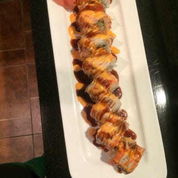 Yamato - a plate of sushi rolls with sauce - Japanese Near Me - Columbia, Mississippi