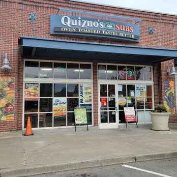 Quiznos - the outside of a restaurant with a car parked in front of it - Sandwiches Near Me - Richmond, California Quiznos - the outside of a restaurant with a car parked in front of it - Sandwiches Near Me - Richmond, California
