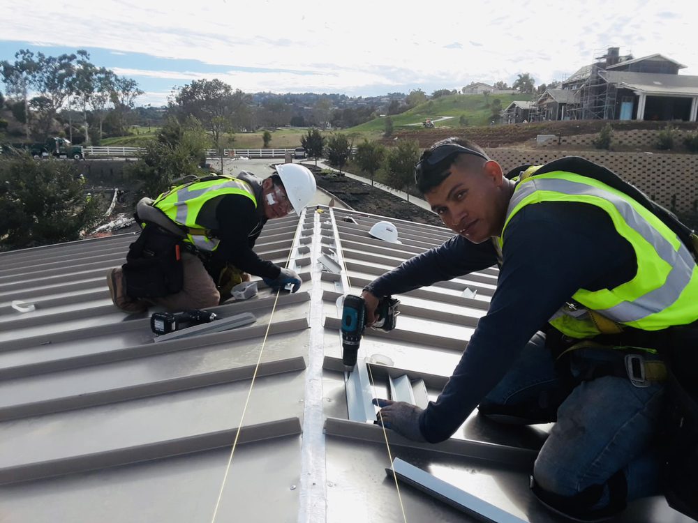 Slide of Green Shield Roofing