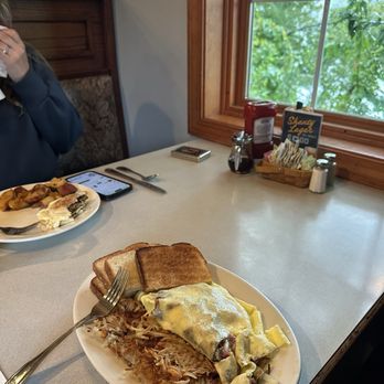 Stephen Anthony's Restaurant - Western omelette and maple sausage egg and cheese with a view of Hager pond. - Breakfast & Brunch Near Me - Marlborough, Massachusetts Stephen Anthony's Restaurant - Western omelette and maple sausage egg and cheese with a view of Hager pond. - Breakfast & Brunch Near Me - Marlborough, Massachusetts
