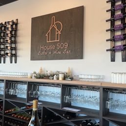 Bar seating with lots of wine Bar seating with lots of wine