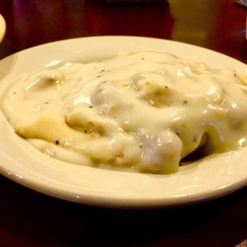 Allies Cafe & Catering - Biscuit and gravy, with sizable pieces of sausage. - Cafes Near Me - South Bend, Indiana