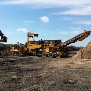 Precision Landscape and Tree - a bulldozer and a pile of dirt - Tree Services Near Me - Little Canada, Minnesota Precision Landscape and Tree - a bulldozer and a pile of dirt - Tree Services Near Me - Little Canada, Minnesota