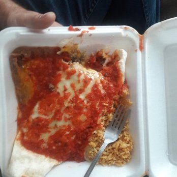Amigo's Mexican Restaurant - Wet Burrito. This pic doesn't do it justice! It's MASSIVE - Mexican Near Me - Woodhaven, Michigan Amigo's Mexican Restaurant - Wet Burrito. This pic doesn't do it justice! It's MASSIVE - Mexican Near Me - Woodhaven, Michigan