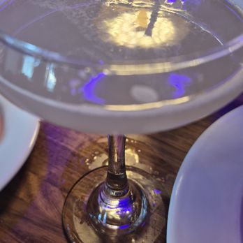 The Common Table - Some sort of martini with lemon and no sparkling juice - Sports Bars Near Me - Mckinney, Texas The Common Table - Some sort of martini with lemon and no sparkling juice - Sports Bars Near Me - Mckinney, Texas