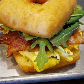 Belle’s Kitchen - Breakfast Sandwich - $5.00- Yumm! Ate every bite Bacon egg and cheese with dressed Arugula - Donuts Near Me - Oklahoma City, Oklahoma Belle’s Kitchen - Breakfast Sandwich - $5.00- Yumm! Ate every bite Bacon egg and cheese with dressed Arugula - Donuts Near Me - Oklahoma City, Oklahoma
