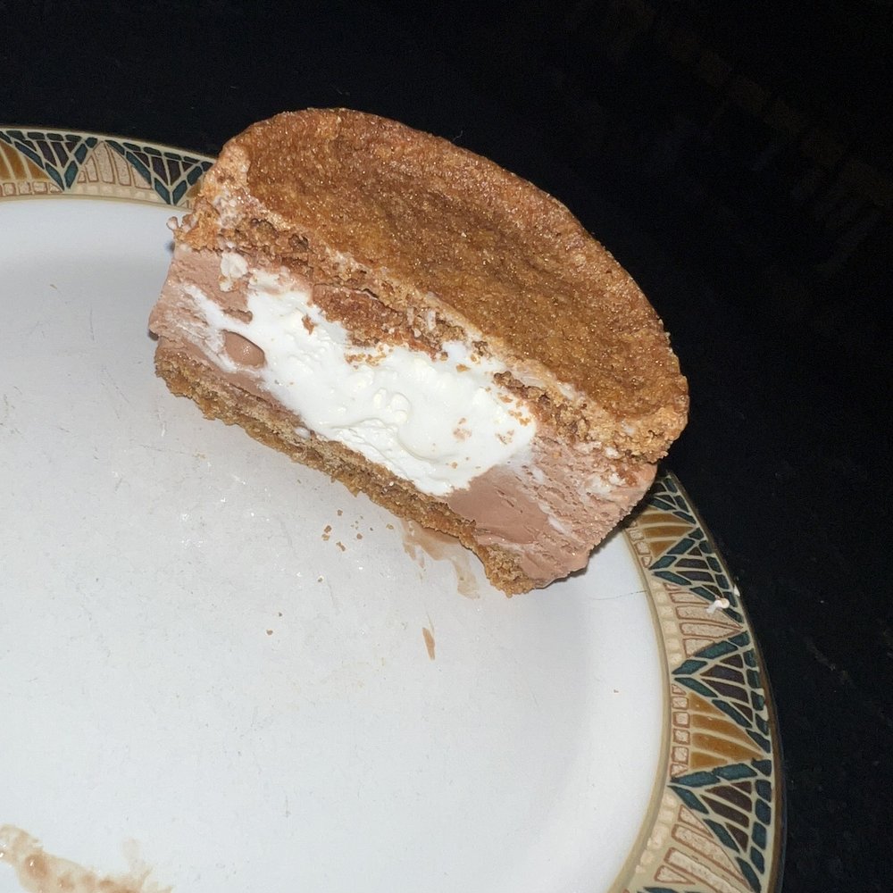 a half eaten ice cream sandwich