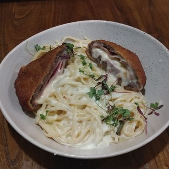 KOW Restaurant - From the Americas, breaded steak with cheese and ham - Comfort Food Near Me - Miami, Florida KOW Restaurant - From the Americas, breaded steak with cheese and ham - Comfort Food Near Me - Miami, Florida
