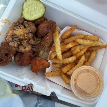 Dave's Hot Chicken - Another view-Cauli Bites Hot Box with pickles, fries and Dave sauce - Chicken Shop Near Me - Gainesville, Florida