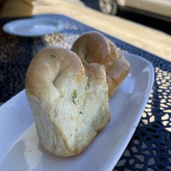 Glass Onion - Our Famous Garlic Rolls were a good start to our meal. - Italian Near Me - Weaverville, North Carolina Glass Onion - Our Famous Garlic Rolls were a good start to our meal. - Italian Near Me - Weaverville, North Carolina