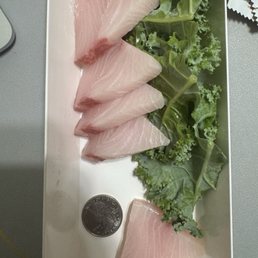 Quarter next to the sushi for reference. Disappointed in the size for the prize. That is almost a $5 piece of fish. Quarter next to the sushi for reference. Disappointed in the size for the prize. That is almost a $5 piece of fish.