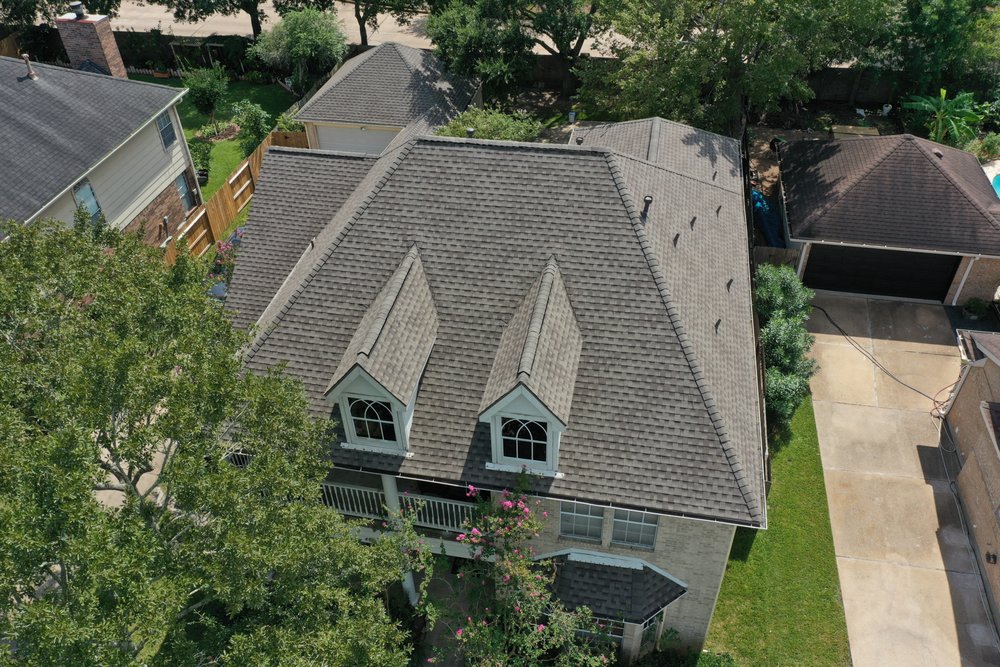 Slide of Stone Castle Roofing