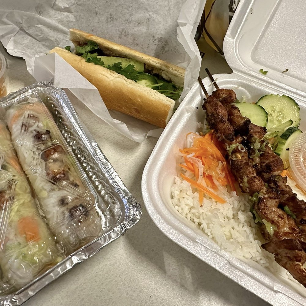 Tasty Grill - Pork skewers on spring rolls, chicken skewers on white rice and pork skewers on banh mi - Food Trucks Near Me Tasty Grill - Pork skewers on spring rolls, chicken skewers on white rice and pork skewers on banh mi - Food Trucks Near Me