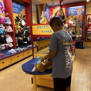 Build A Bear Workshop - My son dressing his bear - Toy Stores Near Me - Fairfield, California