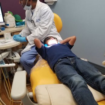 All Smiles Pediatric Dentistry - The son chilling during the pro (dentist) beautifying his teeth and perfecting his handsome smile! - Pediatric Dentists Near Me - San Diego, California All Smiles Pediatric Dentistry - The son chilling during the pro (dentist) beautifying his teeth and perfecting his handsome smile! - Pediatric Dentists Near Me - San Diego, California