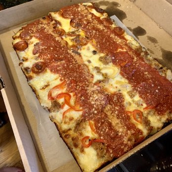 Avenue Kitchen + Bar - The Reg Pizza half pepperoni with onion, half sausage w/ peppers and onions - Beer Bar Near Me - Somerville, Massachusetts