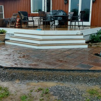 Upstate Landscape & Design - a patio with steps leading to a deck - Landscaping Near Me Upstate Landscape & Design - a patio with steps leading to a deck - Landscaping Near Me