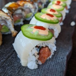 Polar Bear roll. $17. Spicy tuna and cucumber rolled with escolar and jalapenos.