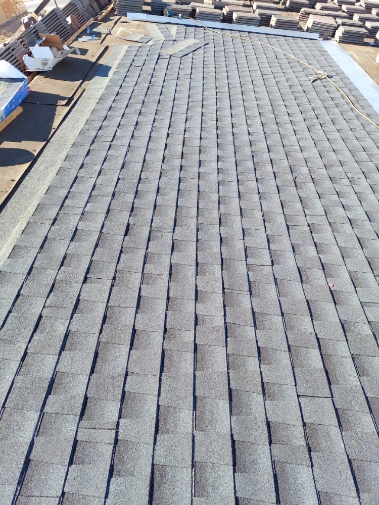 Slide of Huertas roofing