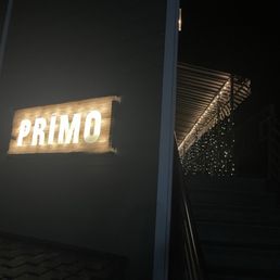 Exterior outside entrance of Primo Italia - night time sign - Torrance, California Exterior outside entrance of Primo Italia - night time sign - Torrance, California