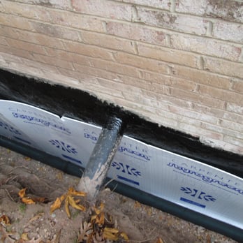 Vortex Drainage Systems - Excavated and Cleaned wall. Application of 2 coats of elasto-mulsion liquid membrane and protection board.. - Waterproofing Near Me - Durham, North Carolina